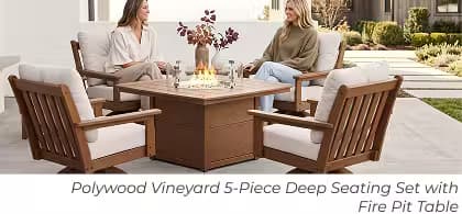 Polywood Vineyard deep seating set with square fire pit table and two women talking on a patio.