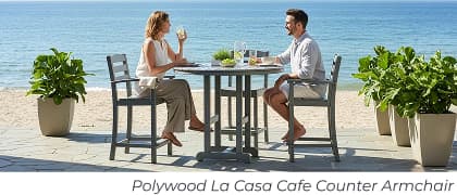 Couple drinks at outdoor high table. Image Text: Polywood La Casa Cafe Counter Armchair